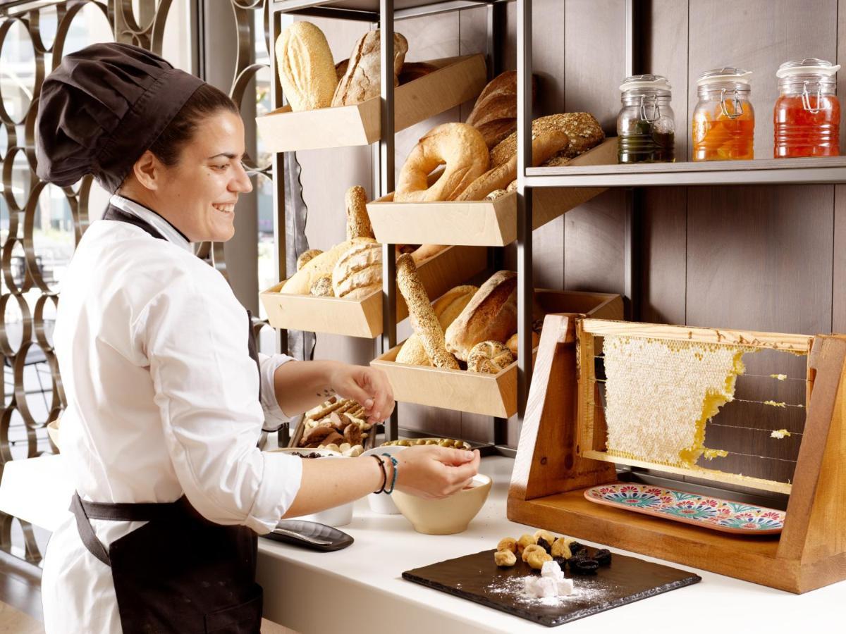 Nautilux Rethymno By Mage Hotels Bagian luar foto A pastry chef at work