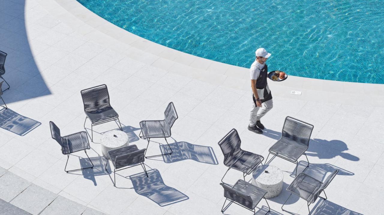 Nautilux Rethymno By Mage Hotels Bagian luar foto The poolside at the Four Seasons Hotel, Milan