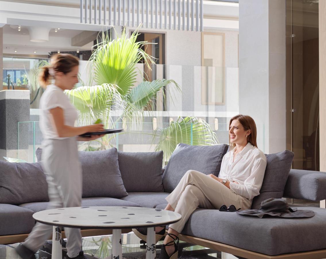 Nautilux Rethymno By Mage Hotels Bagian luar foto A hotel guest being served